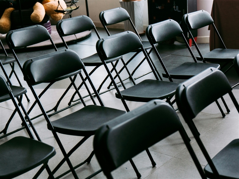 Black folding chair rental - Hire near you